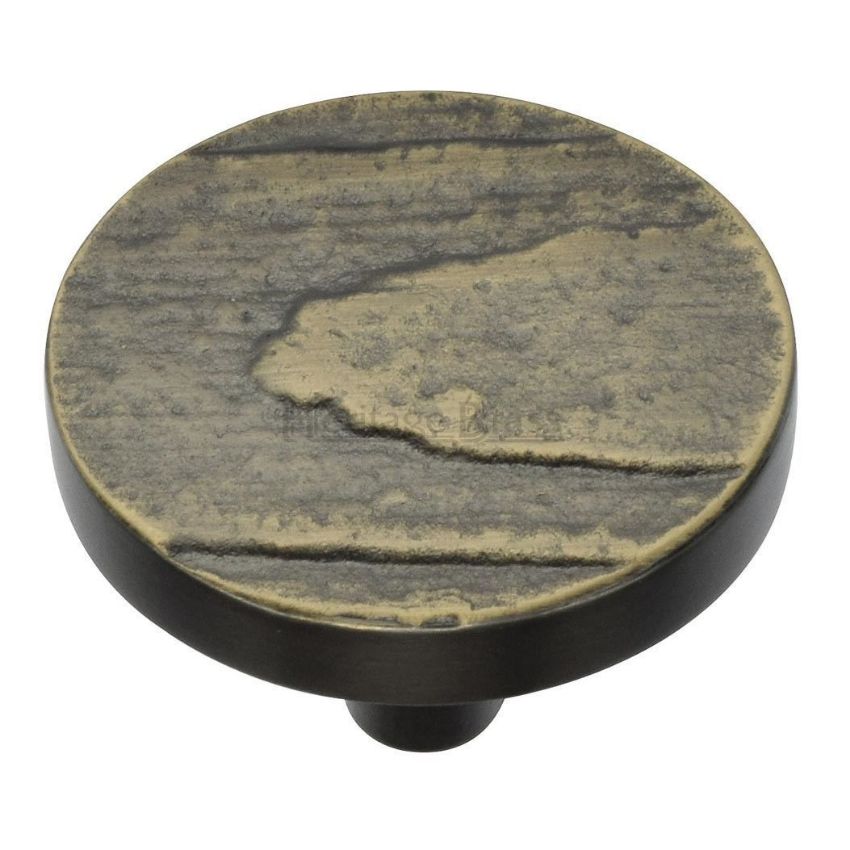 Round Pine Cabinet Knob in an Aged Brass Finish- C3697-AB