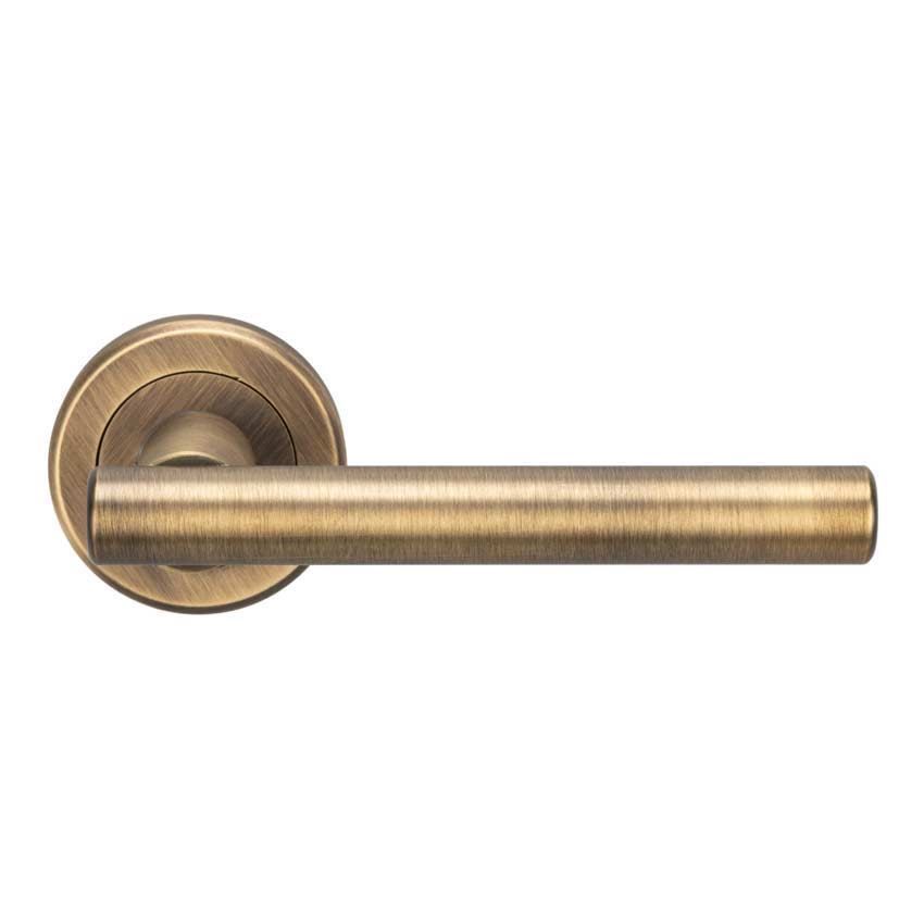 Philadelphia Door Handle on a Rose in Antique Brass - ZIN3121AB