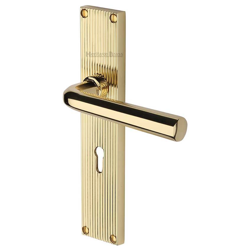Picture of Octave Reeded Backplate Lock Door Handles In Polished Brass Finish - RR3700-PB-EXT