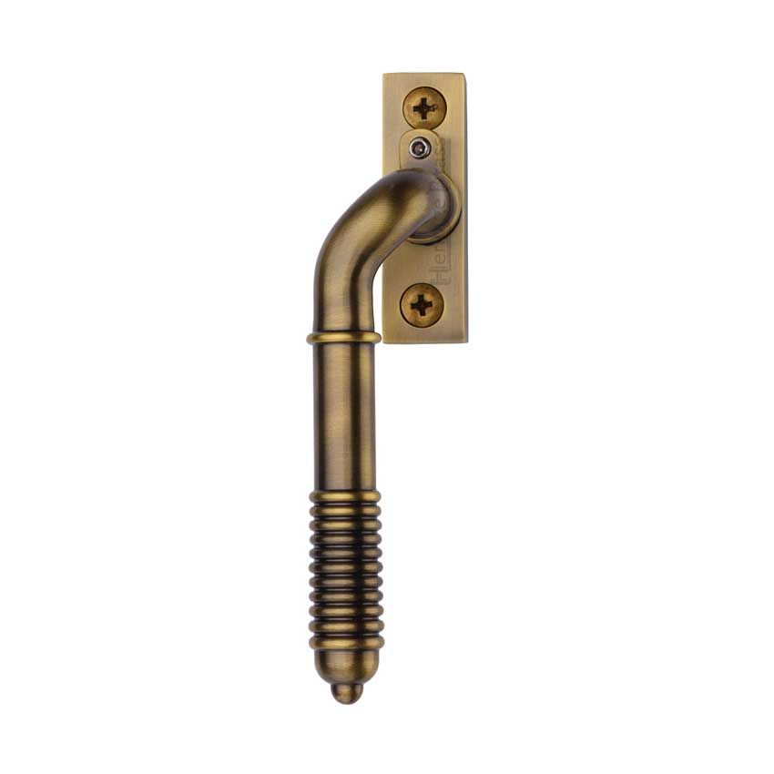 Picture of Heritage Brass Lockable Espagnolette Handle, Left Handed Reeded Design In Antique Brass - V895L LH-AT