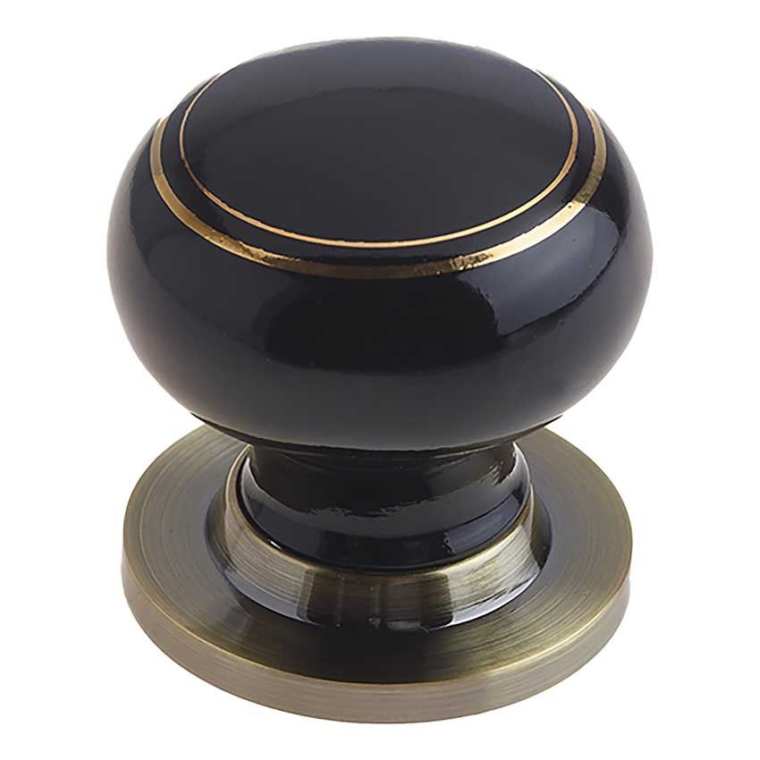 Picture of Black Porcelain Gold Line Mortice Door Knob on an Antique Brass Rose  - JC70+JC80RAB